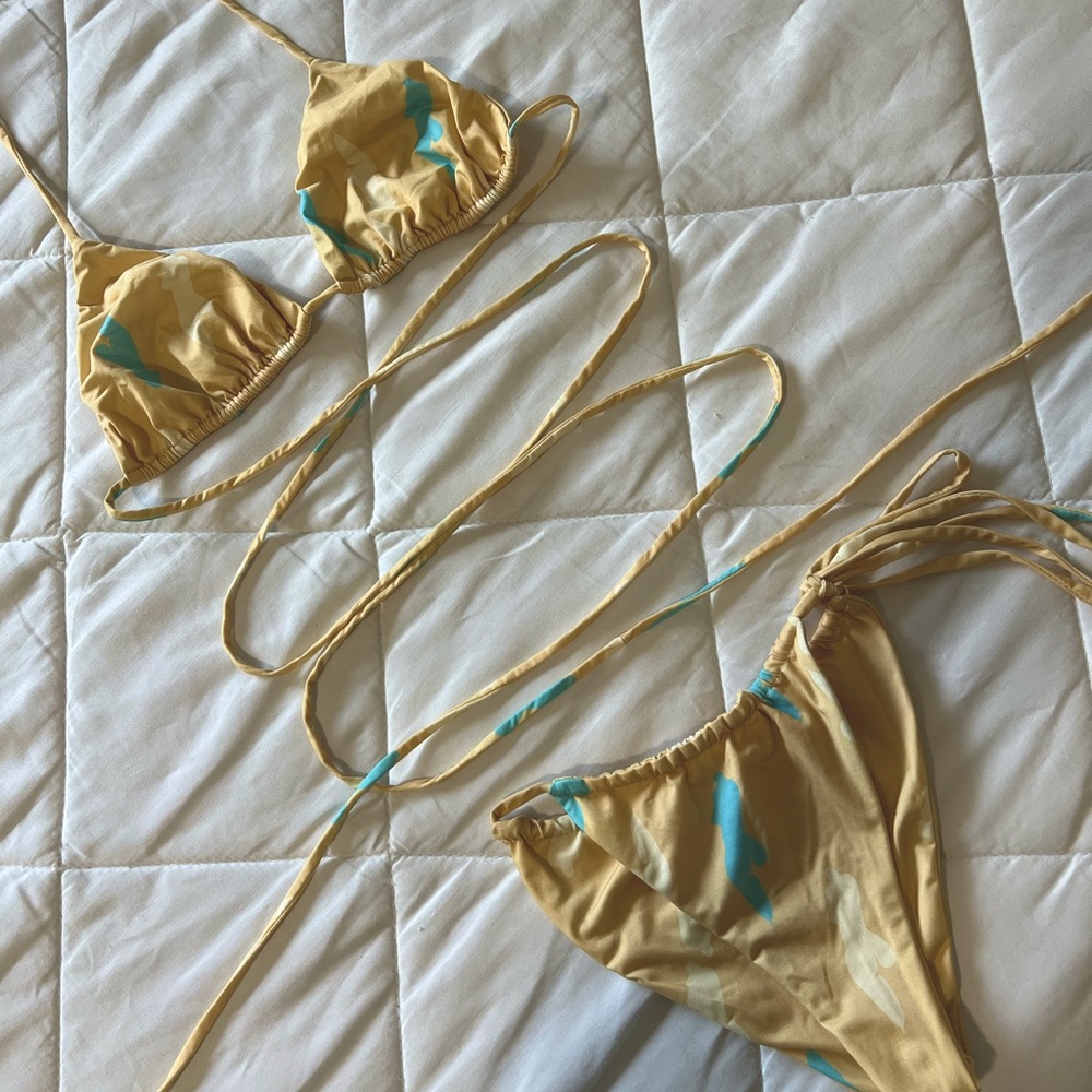 Emrata’s brand. Size small. Cream w other print accents.